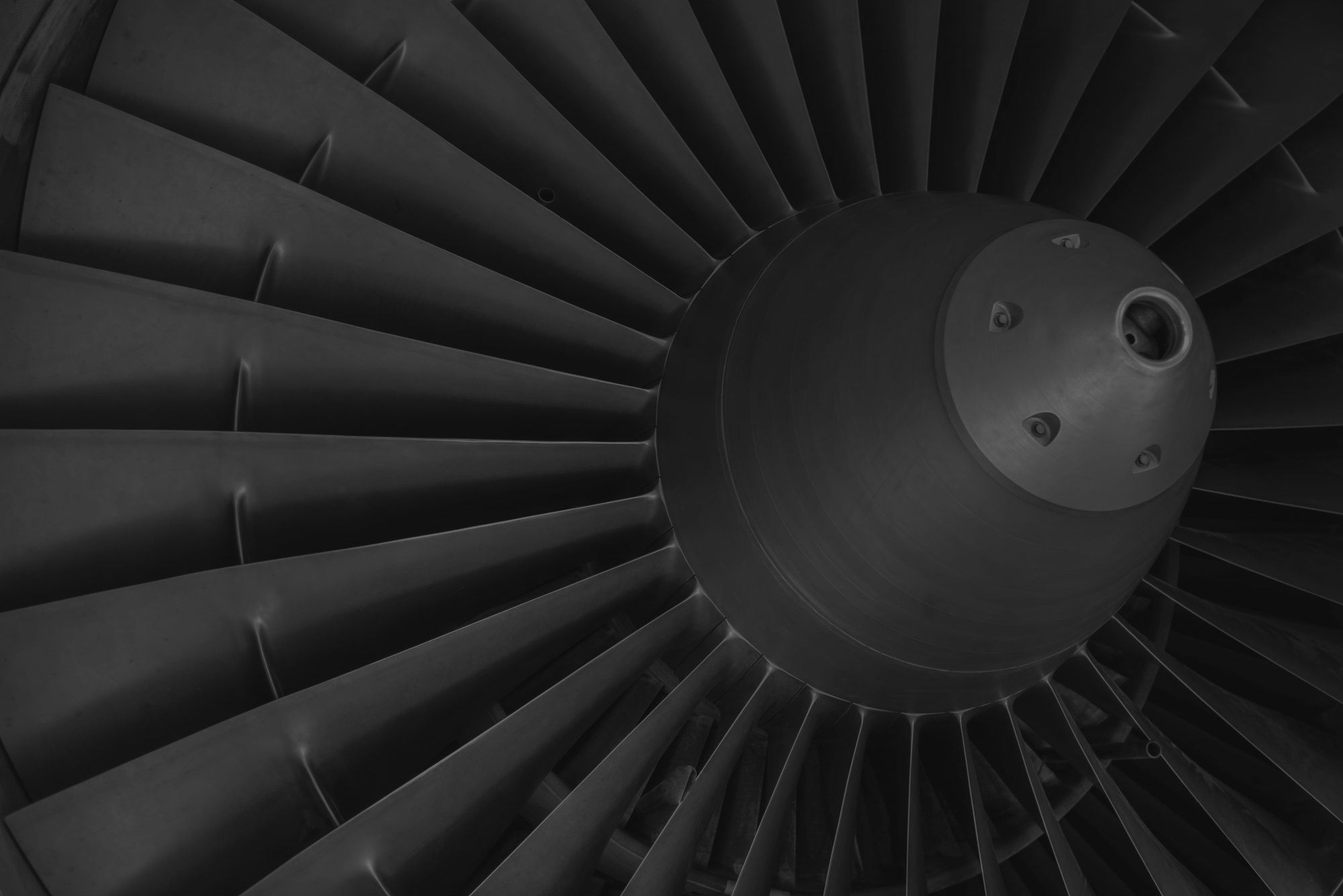 Top background, black & white aircraft turbine